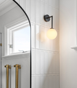 lighting republic-orb-long arm wall light-medium-dark bronze-in situ-001.webp