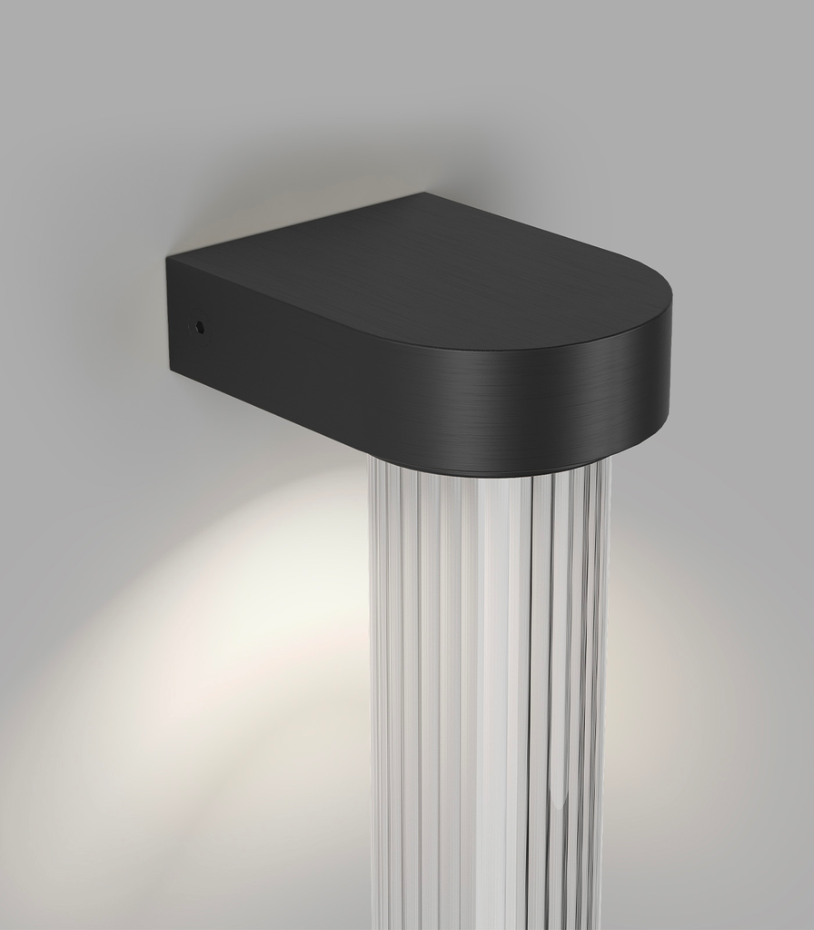 lighting republic-edge wall light-iron-clear ribbed-close up 2-on.webp