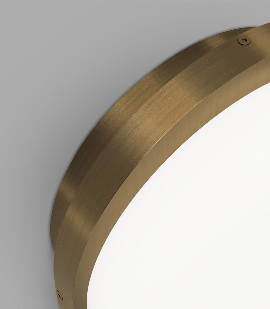 lighting republic-bode round wall light-old brass-close-on.webp